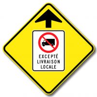 Signal avancé d'accès interdit aux camions sauf pour livraison locale